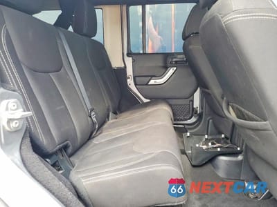 Zdjęcie 11 z 13 samochodu: 2016 JEEP WRANGLER UNLIMITED SAHARA VIN:1C4BJWEG0GL253326 - miniatura