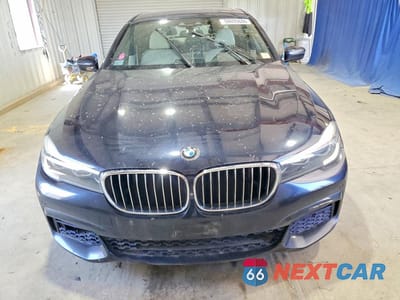 Piąte zdjęcie samochodu w środku: 2016 BMW 740 I VIN:WBA7E2C58GG548104 - miniatura