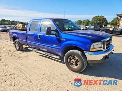 Czwarte zdjęcie samochodu z boku: 2003 FORD F250 SUPER DUTY VIN:1FTNW21F13EA79138 - miniatura