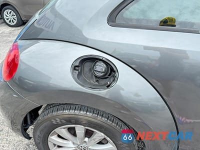Zdjęcie 13 z 14 samochodu: 2014 VOLKSWAGEN BEETLE VIN:3VWFP7AT7EM621339 - miniatura