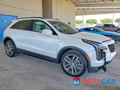 Czwarte zdjęcie samochodu z boku: 2023 CADILLAC XT4 SPORT VIN:1GYFZER4XPF101745 - miniatura