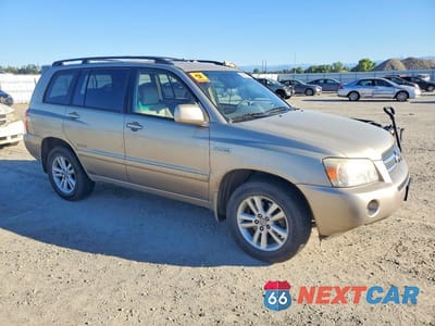 Czwarte zdjęcie samochodu z boku: 2006 TOYOTA HIGHLANDER HYBRID VIN:JTEEW21A460023678 - miniatura