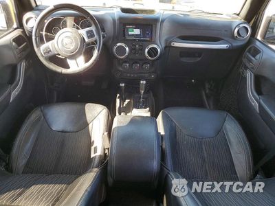 Zdjęcie 8 z 14 samochodu: 2015 JEEP WRANGLER UNLIMITED SPORT VIN:1C4BJWDG6FL573363 - miniatura