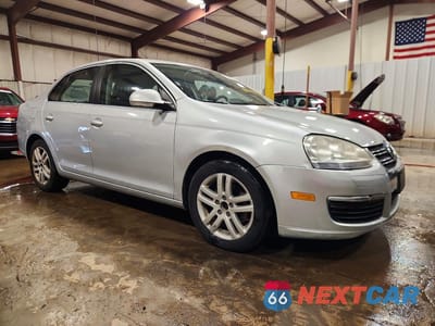 Czwarte zdjęcie samochodu z boku: 2009 VOLKSWAGEN JETTA TDI VIN:3VWAL81K49M141641 - miniatura
