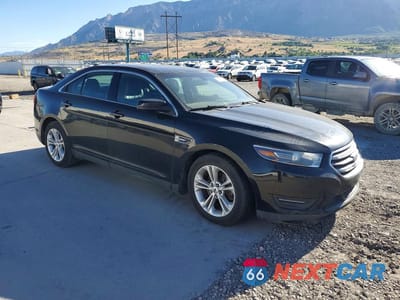 Czwarte zdjęcie samochodu z boku: 2015 FORD TAURUS SEL VIN:1FAHP2E91FG154756 - miniatura