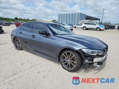 Czwarte zdjęcie samochodu z boku: 2021 BMW 330I VIN:3MW5R1J04M8B70158 - miniatura