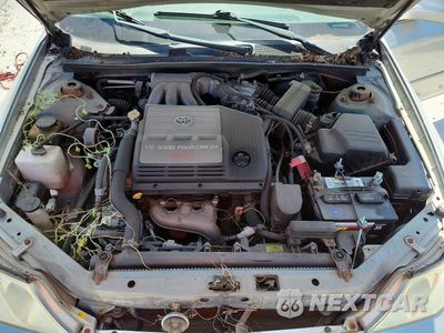 Zdjęcie 11 z 12 samochodu: 2002 TOYOTA AVALON XLS VIN:4T1BF28B82U247394 - miniatura
