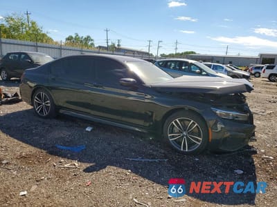 Czwarte zdjęcie samochodu z boku: 2021 BMW 750 XI VIN:WBA7U2C04MCE60972 - miniatura