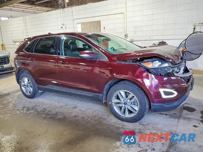 Czwarte zdjęcie samochodu z boku: 2018 FORD EDGE SEL VIN:2FMPK4J90JBC51805 - miniatura