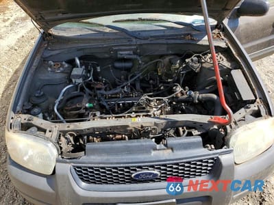Zdjęcie 12 z 13 samochodu: 2003 FORD ESCAPE VIN:1FMYU02143KD77352 - miniatura