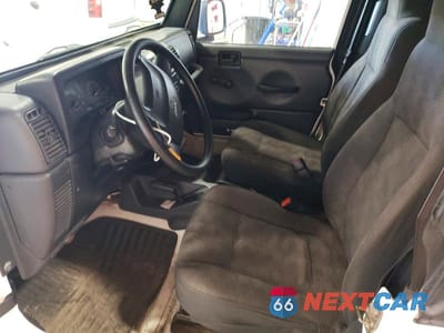 Zdjęcie 7 z 12 samochodu: 2004 JEEP WRANGLER VIN:1J4FA29104P787120 - miniatura