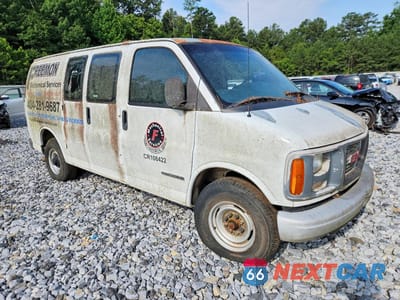 Czwarte zdjęcie samochodu z boku: 1999 GMC SAVANA G3500 VIN:1GTHG35RXX1154212 - miniatura