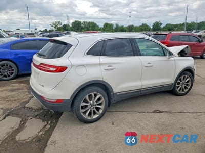 Trzecie zdjęcie samochodu z tyłu: 2015 LINCOLN MKC VIN:5LMCJ2A94FUJ36421 - miniatura