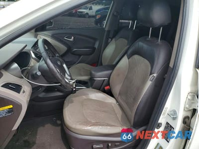 Zdjęcie 7 z 12 samochodu: 2012 HYUNDAI TUCSON LIMITED VIN:KM8JUCAC0CU405268 - miniatura