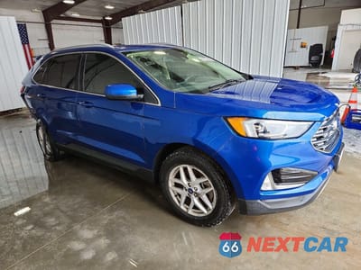 Czwarte zdjęcie samochodu z boku: 2022 FORD EDGE SEL VIN:2FMPK4J93NBA20094 - miniatura