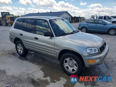 Czwarte zdjęcie samochodu z boku: 2000 TOYOTA RAV4 BASE VIN:JT3HP10V2Y0243163 - miniatura
