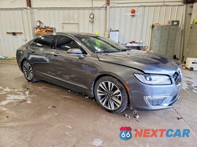 Czwarte zdjęcie samochodu z boku: 2017 LINCOLN MKZ HYBRID RESERVE VIN:3LN6L5MU5HR608244 - miniatura