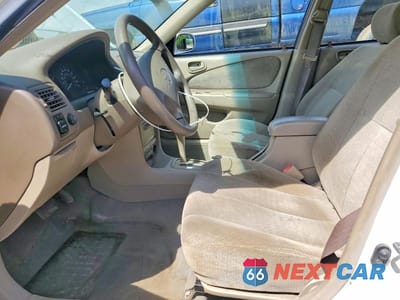 Zdjęcie 7 z 12 samochodu: 2002 TOYOTA COROLLA LE VIN:1NXBR12E12Z584221 - miniatura