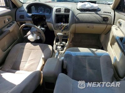Zdjęcie 8 z 13 samochodu: 2001 MAZDA PROTEGE DX VIN:JM1BJ222010455626 - miniatura