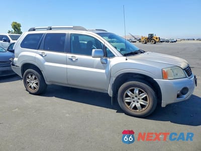 Czwarte zdjęcie samochodu z boku: 2011 MITSUBISHI ENDEAVOR VIN:4A4JN2AS5BE031521 - miniatura