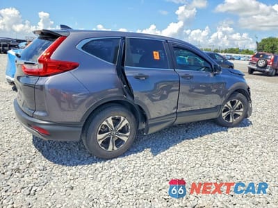 Trzecie zdjęcie samochodu z tyłu: 2018 HONDA CR-V LX VIN:2HKRW5H30JH401845 - miniatura