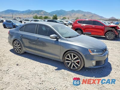 Czwarte zdjęcie samochodu z boku: 2012 VOLKSWAGEN JETTA GLI VIN:3VW4A7AJ7CM034451 - miniatura