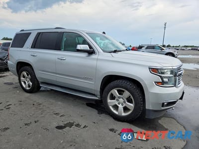 Czwarte zdjęcie samochodu z boku: 2015 CHEVROLET TAHOE K1500 LTZ VIN:1GNSKCKC9FR239179 - miniatura