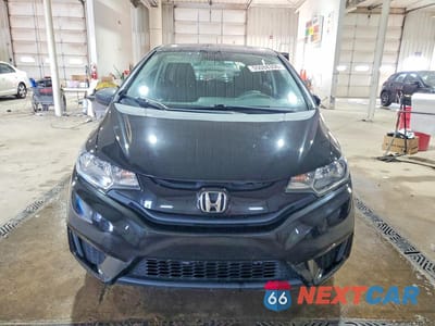 Piąte zdjęcie samochodu w środku: 2015 HONDA FIT LX VIN:3HGGK5G50FM766941 - miniatura