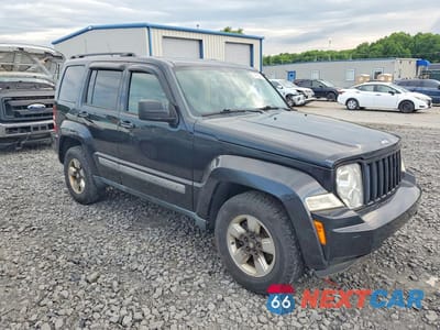 Czwarte zdjęcie samochodu z boku: 2011 JEEP LIBERTY SPORT VIN:1J4PN2GK3BW529780 - miniatura