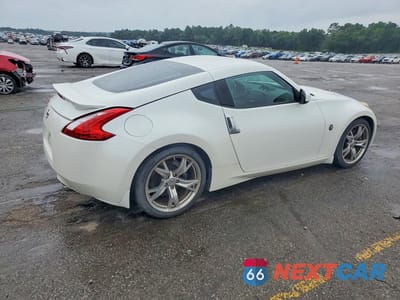 Trzecie zdjęcie samochodu z tyłu: 2009 NISSAN 370Z BASE VIN:JN1AZ44E99M410408 - miniatura