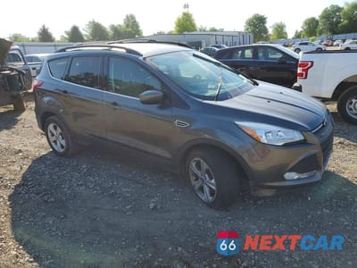 Czwarte zdjęcie samochodu z boku: 2016 FORD ESCAPE SE VIN:1FMCU9G96GUA01811 - miniatura
