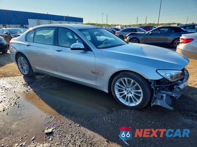 Czwarte zdjęcie samochodu z boku: 2014 BMW 750 LXI VIN:WBAYF8C52ED652591 - miniatura
