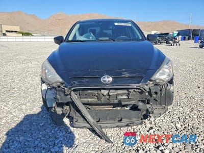 Piąte zdjęcie samochodu w środku: 2016 SCION IA BASE VIN:3MYDLBZV0GY143387 - miniatura