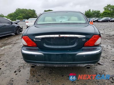 Zdjęcie 6 z 12 samochodu: 2002 JAGUAR X-TYPE 2.5 VIN:SAJEB51D02XC77633 - miniatura