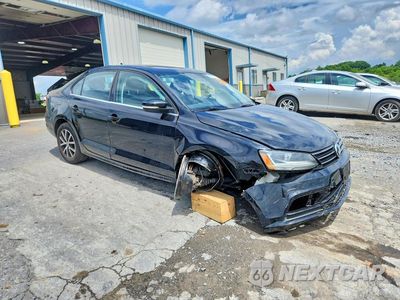 Czwarte zdjęcie samochodu z boku: 2017 VOLKSWAGEN JETTA SE VIN:3VWDB7AJ7HM209477 - miniatura
