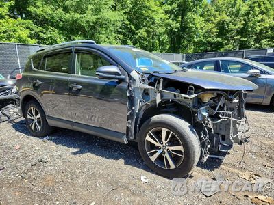 Czwarte zdjęcie samochodu z boku: 2017 TOYOTA RAV4 XLE VIN:JTMRFREV2HD209341 - miniatura