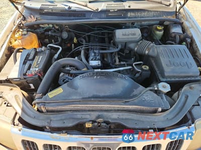 Zdjęcie 12 z 13 samochodu: 2000 JEEP GRAND CHEROKEE LAREDO VIN:1J4GW48S4YC341870 - miniatura