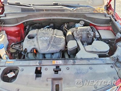 Zdjęcie 12 z 13 samochodu: 2013 HYUNDAI SANTA FE SPORT 2.4L VIN:5XYZT3LB6DG079462 - miniatura