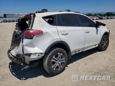 Trzecie zdjęcie samochodu z tyłu: 2017 TOYOTA RAV4 LE VIN:JTMZFREV5HJ715201 - miniatura