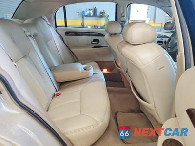 Zdjęcie 10 z 12 samochodu: 1999 LINCOLN TOWN CAR CARTIER VIN:1LNHM83W4XY622002 - miniatura