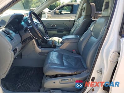 Zdjęcie 7 z 13 samochodu: 2005 HONDA PILOT EXL VIN:2HKYF186X5H551739 - miniatura