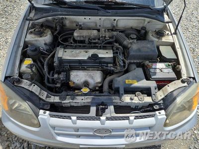 Zdjęcie 11 z 12 samochodu: 2004 HYUNDAI ACCENT GL VIN:KMHCG45C64U553507 - miniatura
