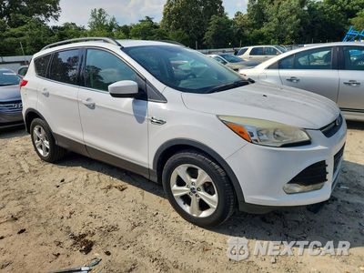 Czwarte zdjęcie samochodu z boku: 2014 FORD ESCAPE SE VIN:1FMCU9G93EUD18913 - miniatura
