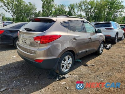 Trzecie zdjęcie samochodu z tyłu: 2012 HYUNDAI TUCSON GLS VIN:KM8JUCAC1CU415808 - miniatura