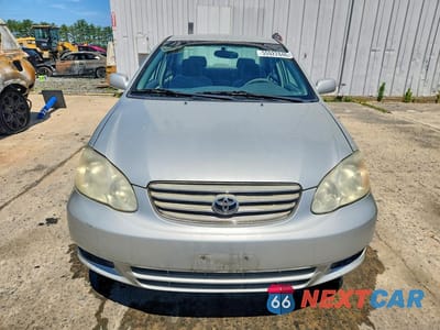 Piąte zdjęcie samochodu w środku: 2003 TOYOTA COROLLA LE VIN:2T1BR32E93C023490 - miniatura
