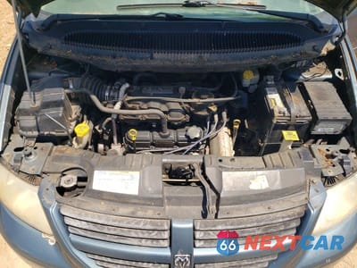 Zdjęcie 12 z 13 samochodu: 2005 DODGE GRAND CARAVAN SXT VIN:2D4GP44L35R262052 - miniatura