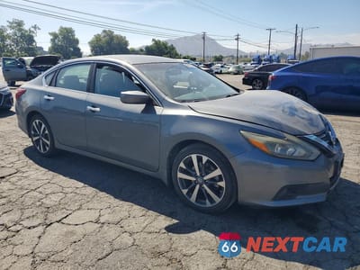 Czwarte zdjęcie samochodu z boku: 2017 NISSAN ALTIMA 2.5 SR VIN:1N4AL3APXHC470450 - miniatura