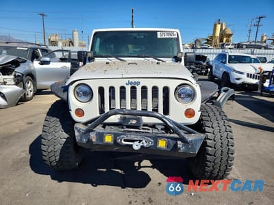 Piąte zdjęcie samochodu w środku: 2013 JEEP WRANGLER UNLIMITED SPORT VIN:1C4BJWDG9DL590218 - miniatura