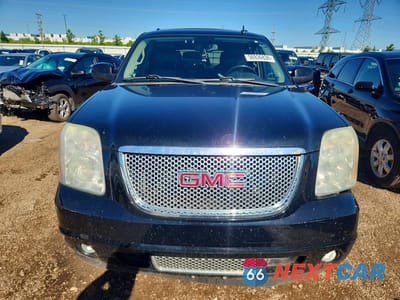 Piąte zdjęcie samochodu w środku: 2011 GMC YUKON DENALI VIN:1GKS2EEF6BR108817 - miniatura