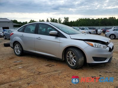 Czwarte zdjęcie samochodu z boku: 2018 FORD FOCUS SE VIN:1FADP3F29JL324223 - miniatura